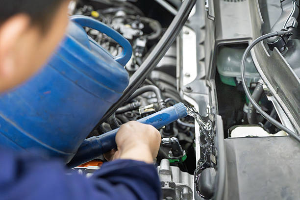 refilling car radiator with water